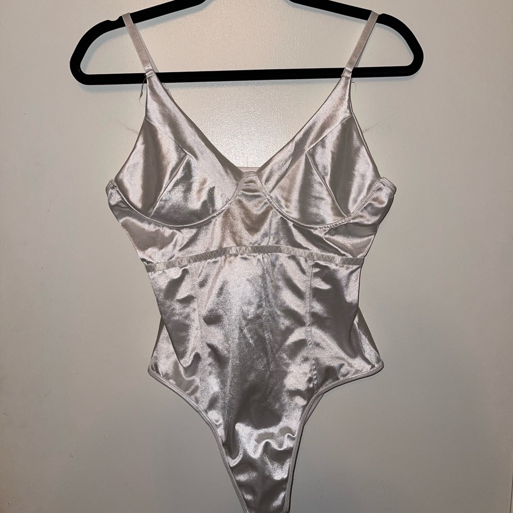 ** Satin white bodysuit **